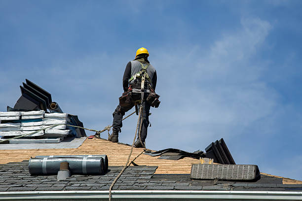 Professional Roof Replacement technician working in Harrison, MI